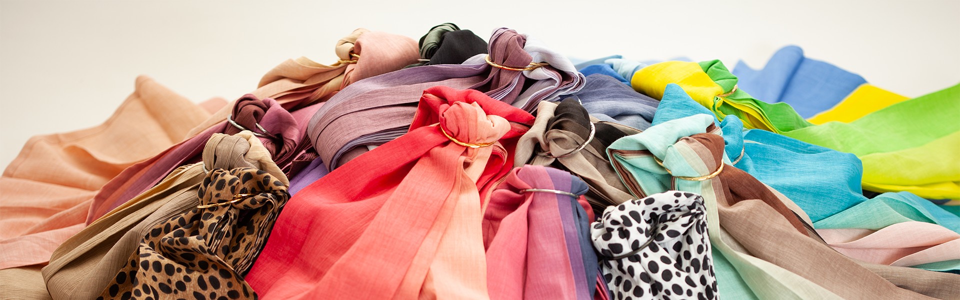 PsLing New York ring sling collection in various colors and patterns