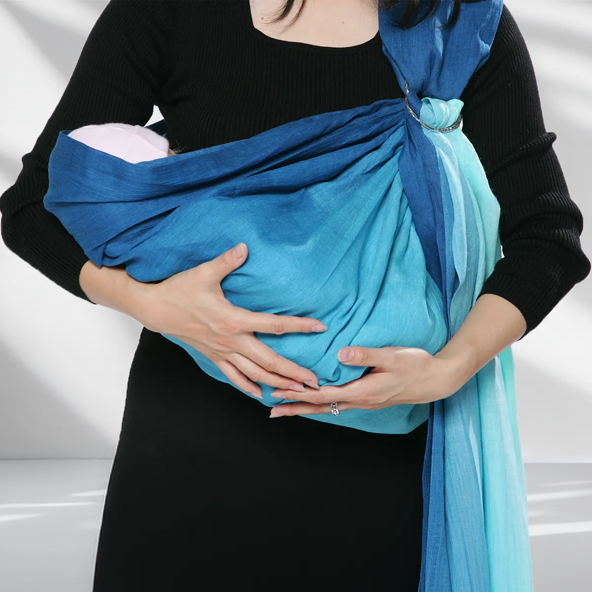 Step 11: Supporting the Head. Pull the top edge of the fabric up to support your baby’s head. Their weight should be evenly distributed, creating a horizontal line of perfect balance.